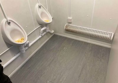 staff urinal cleaning - commercial cleaning South UK - extra touches